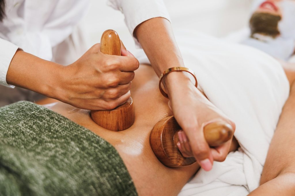 Maderotherapy Massage With Wooden Cup In A Spa Centre